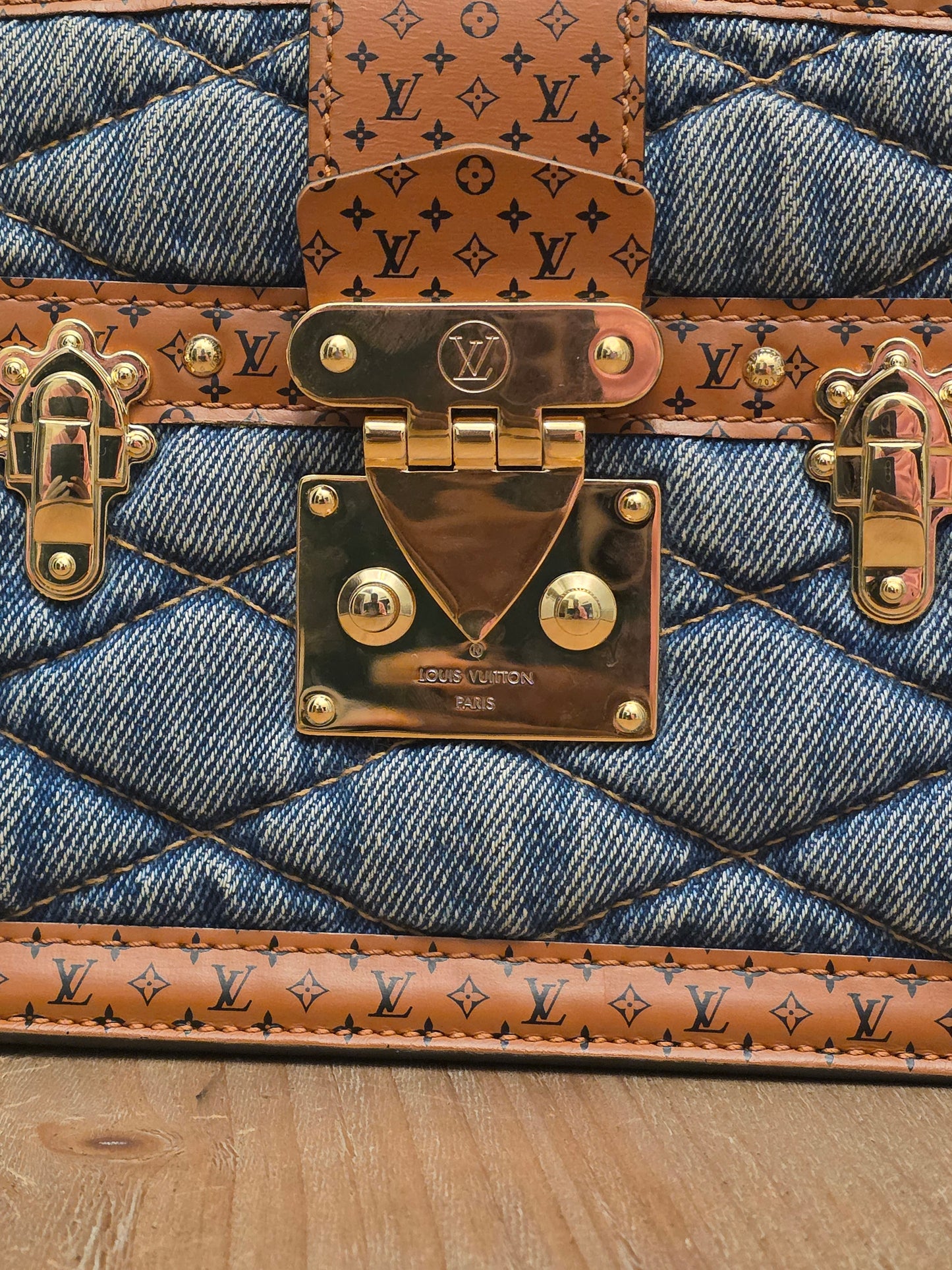 Louis Vuitton Denim Quilted Trunk Chain Wallet Bag  Description